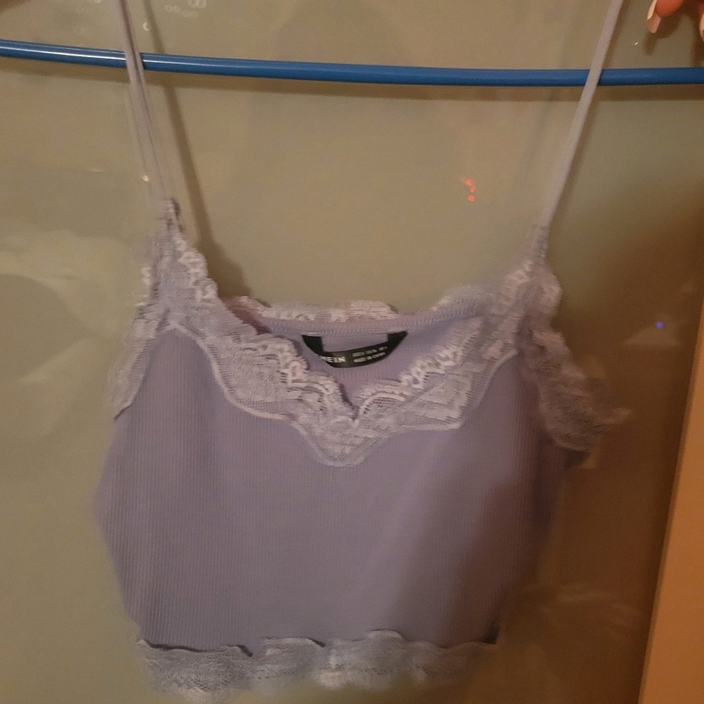 A crop top from SHEIN. Haven’t touched in 3 years. Got a lacy front design.